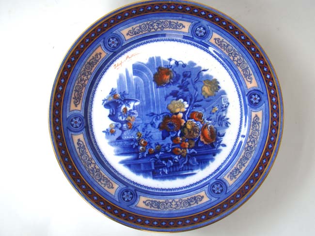 A RARE set of Nine antique DOULTON "Flow Blue" dinner plates including the original Master plate